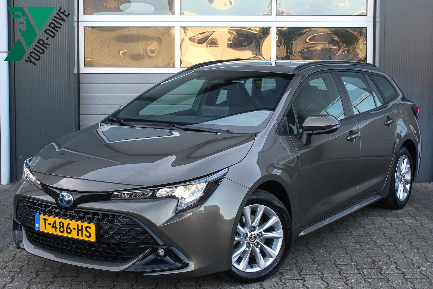 Toyota Corolla Touring Sports - Hybrid 140 Active Automaat | Facelift | Nette en complete NL auto van de eerste eigenaar - AutoWereld.nl