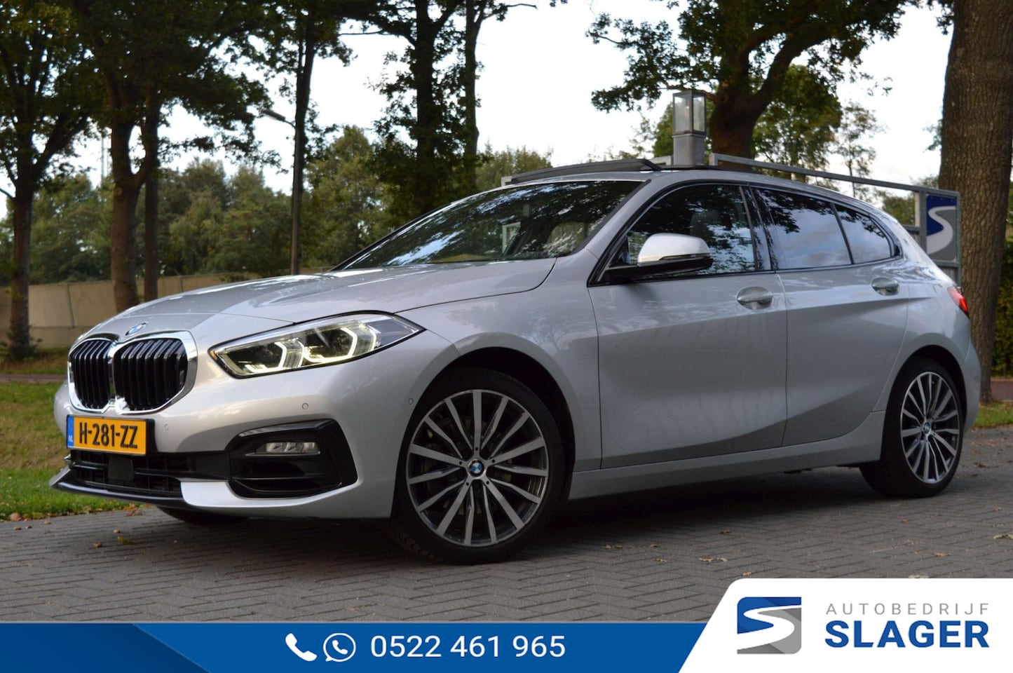 BMW 1-serie - 118i High Executive Edition - Pano|Trekhaak|Camera|Leer|Carplay - AutoWereld.nl