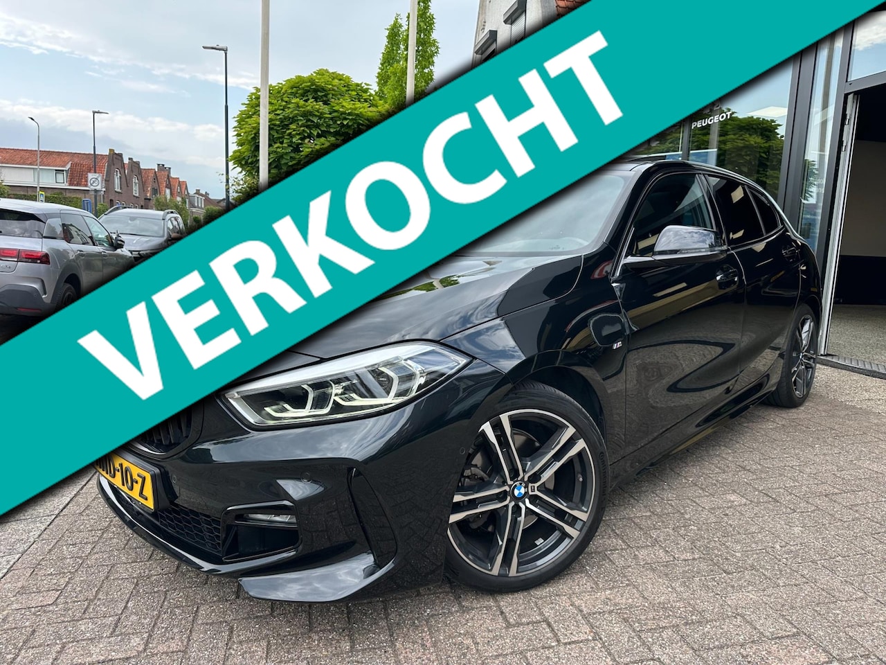 BMW 1-serie - 118i Executive|M Pakket|Pano|Sfeer Verlichting|Half Leder - AutoWereld.nl