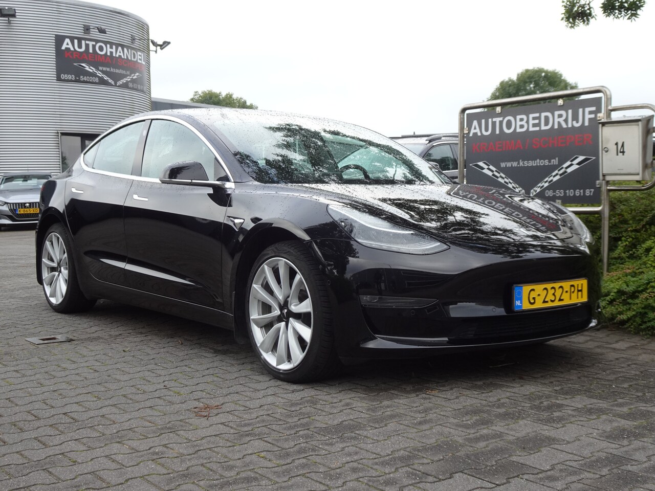 Tesla Model 3 - Long Range RWD Long Range AWD 75 kWh - AutoWereld.nl