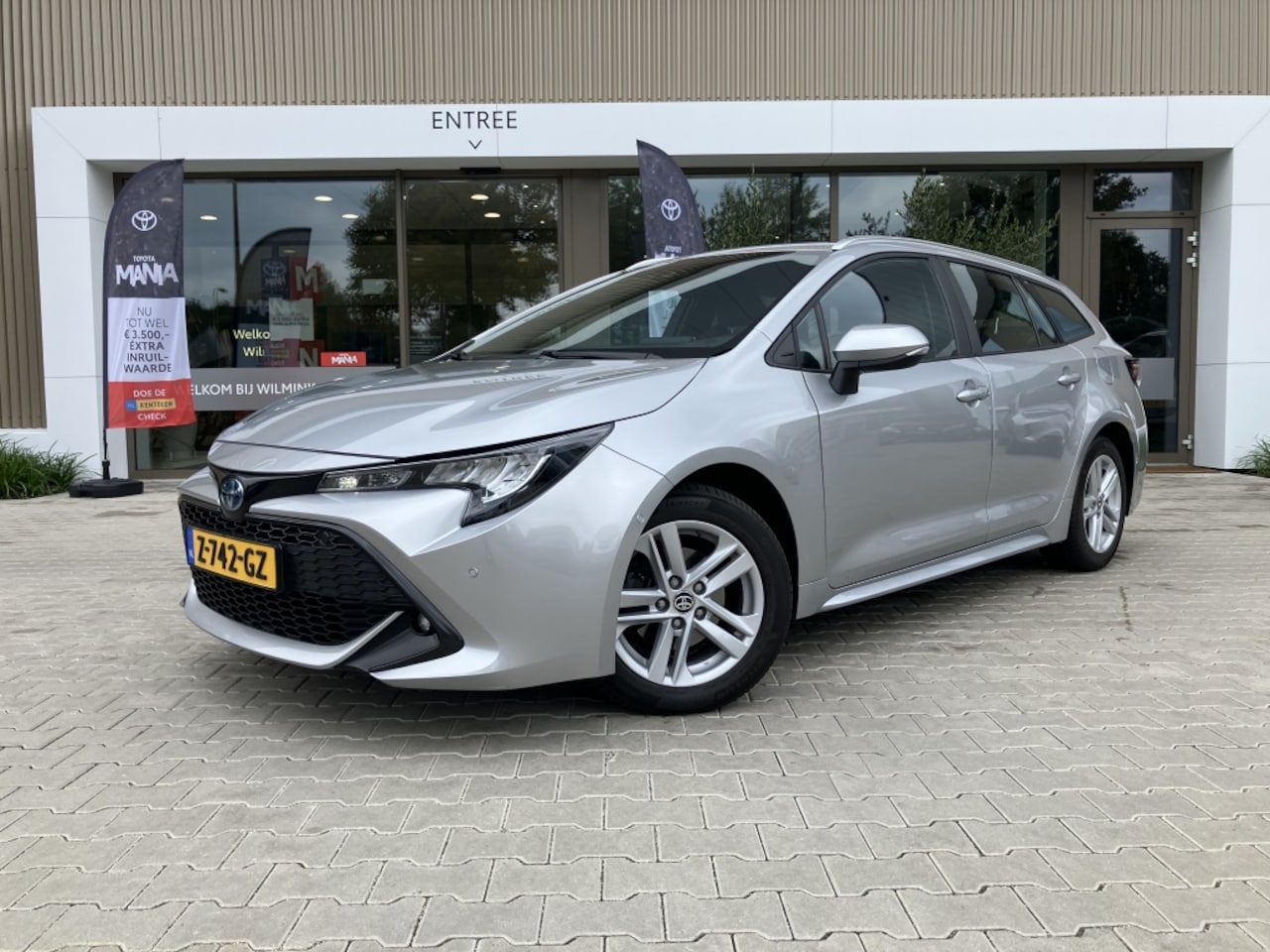 Toyota Corolla Touring Sports - 1.8 Hybrid Buniness | PDC V/A | Camera | Stoelverw - AutoWereld.nl