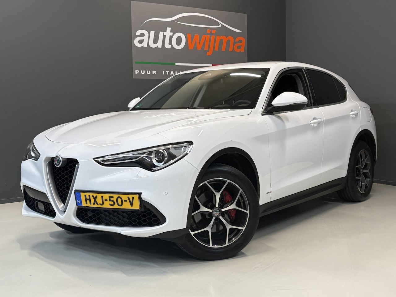 Alfa Romeo Stelvio - 2.0 Turbo 280pk AWD Super Q4 Apple carplay, stuurschakeling, performance pack, Afneembare - AutoWereld.nl