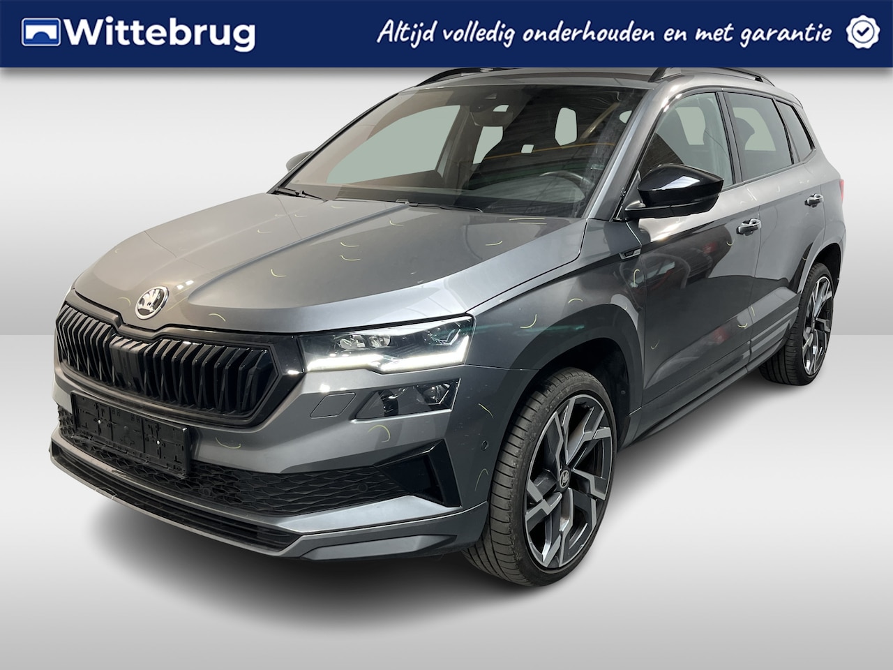 Skoda Karoq - 1.5 TSI ACT Sportline Business / AUTOMAAT/ 360 CAMERA/ PARK. SENSOREN/ KEYLESS/ CRYSTAL LI - AutoWereld.nl