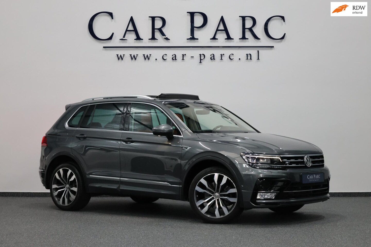 Volkswagen Tiguan - 2.0 TSI 4Motion 220+PK R-LINE LED/VIRTUAL/HUD/PANO/LEER+S.VERWARMING+MEMORY/20"/360 CAM/LI - AutoWereld.nl
