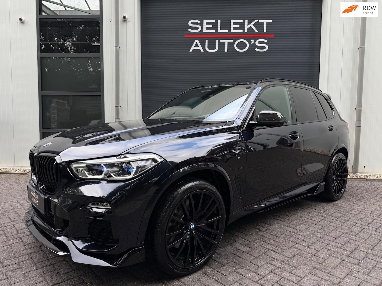 BMW X5 - XDrive45e High Executive M-Sport Pano/Sky Lounge/22 Inch/Head Up/Laser/Luchtvering/Ambient - AutoWereld.nl