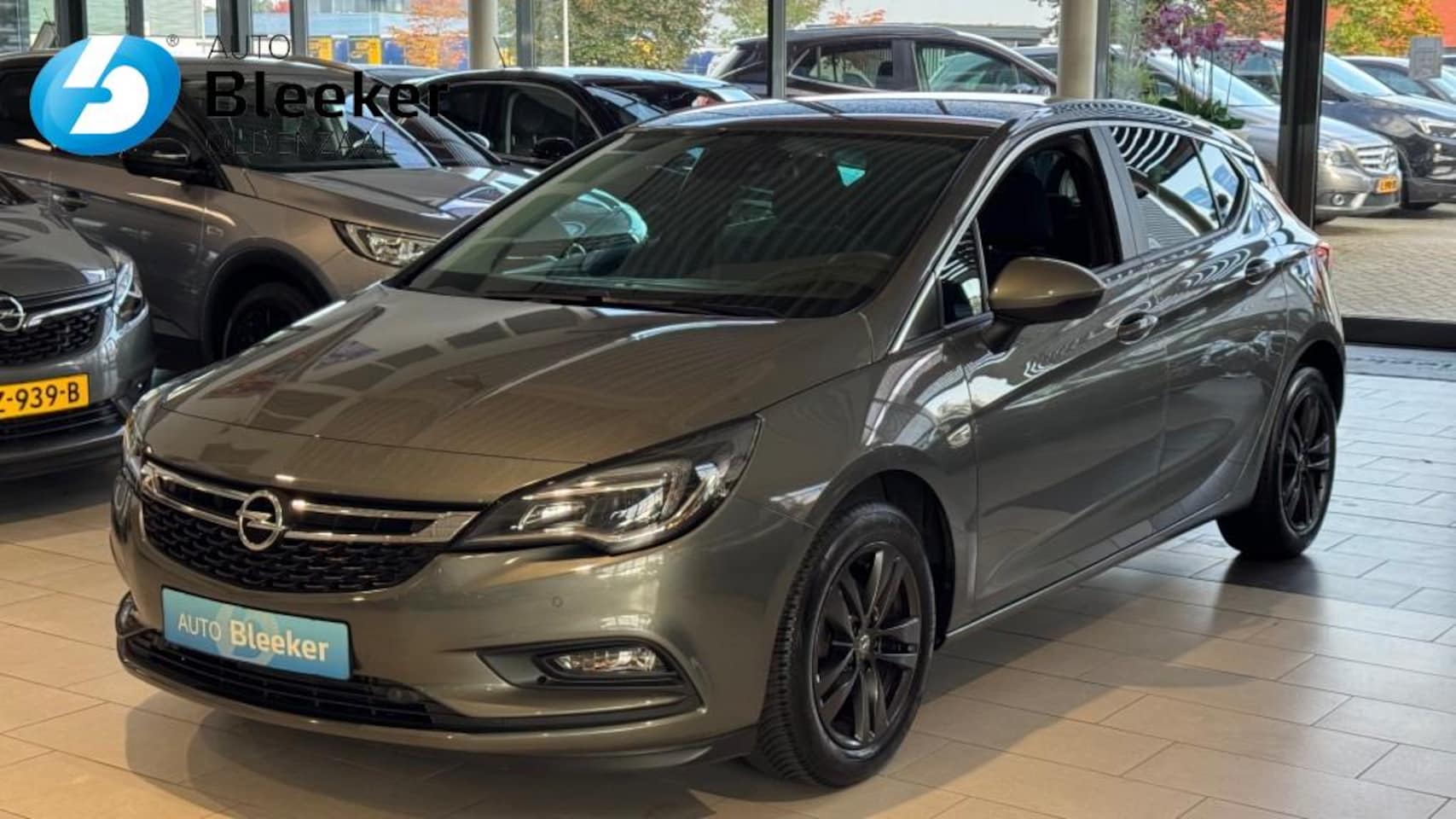 Opel Astra - 1.0 105 pk Enjoy Airco Carplay Stoel stuur verwarmd AGR stoel PDC - AutoWereld.nl