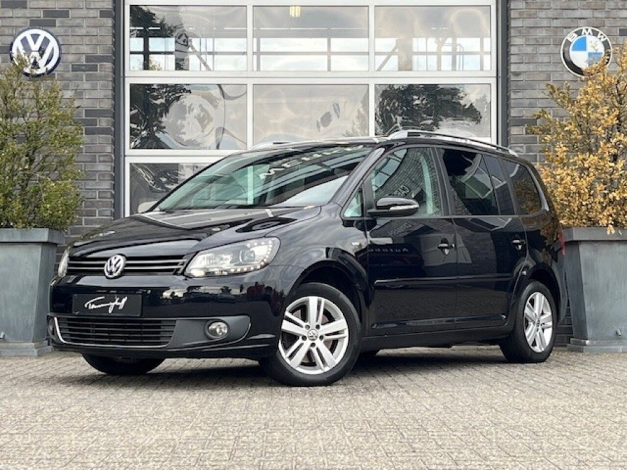 Volkswagen Touran - 1.4 TSI AUT. - 7-PERSOONS - PANO - NAVI - BI XENON - AutoWereld.nl