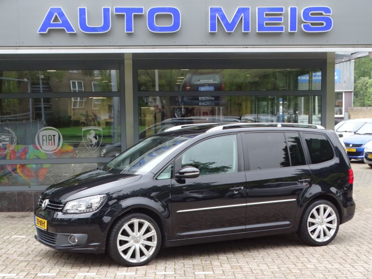 Volkswagen Touran - 1.4 TSI Highline Panoramadak Leder Navi Camera Clima Cruise PDC - AutoWereld.nl
