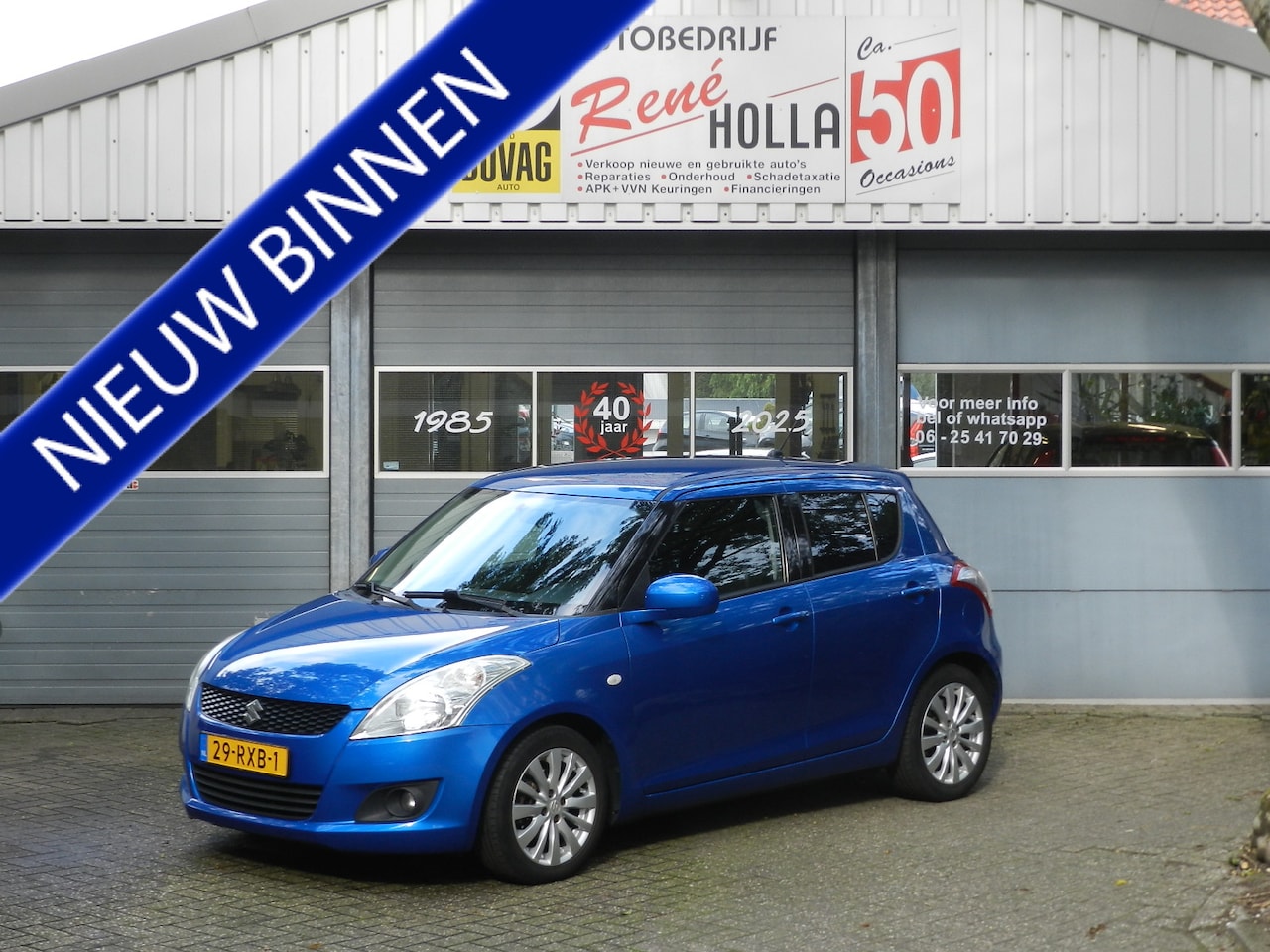 Suzuki Swift - 1.2 Exclusive EASSS Climate & Cruise contr LMV Metallic lak - AutoWereld.nl