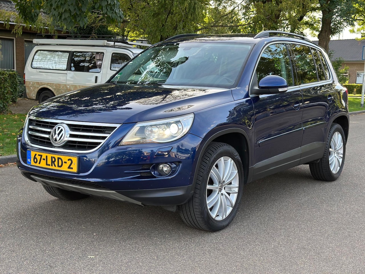 Volkswagen Tiguan - 2.0 TSI Sport&Style 4Motion Navi Xenon Cruise Trekhaak - AutoWereld.nl