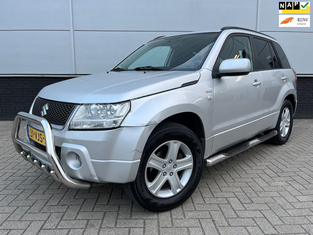Suzuki Grand Vitara - VAN 1.9 Exclusive 4x4 - Airco - cruise control - trekhaak - Lm velgen - AutoWereld.nl