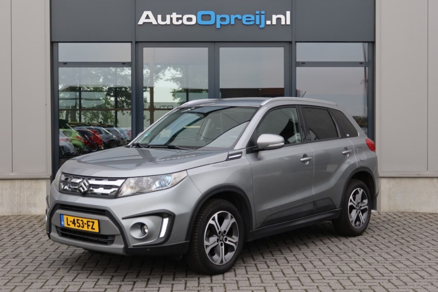 Suzuki Vitara - 1.6 High Executive NAVI, Camera, Leder bekleding, Cruise - AutoWereld.nl