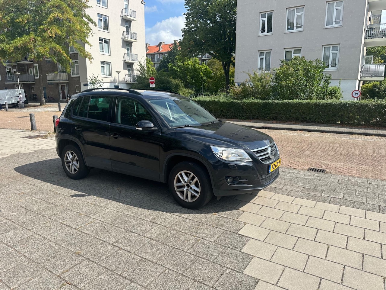 Volkswagen Tiguan - 1.4 TSI Cruise PDC Trekhaak Black Magic - AutoWereld.nl