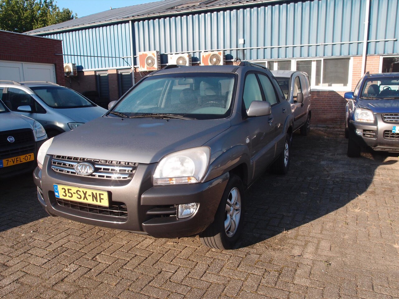Kia Sportage - 2.0 CVVT 4WD Adventure 1e Eign Export prijs - AutoWereld.nl