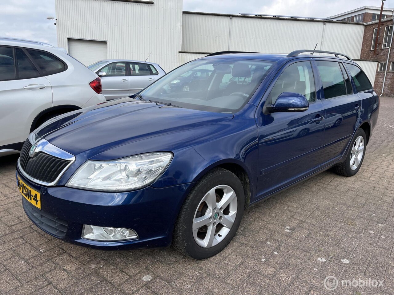 Skoda Octavia Combi - 1.2 TSI Tour Business Line 1.2 TSI Tour Business Line - AutoWereld.nl