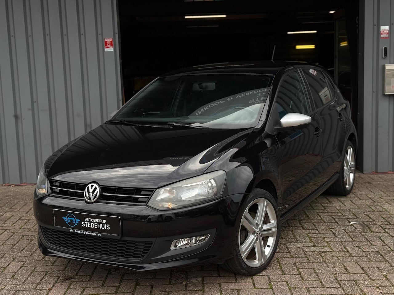 Volkswagen Polo - 1.2 TSI Highline Black Edition CarPlay | PDC - AutoWereld.nl