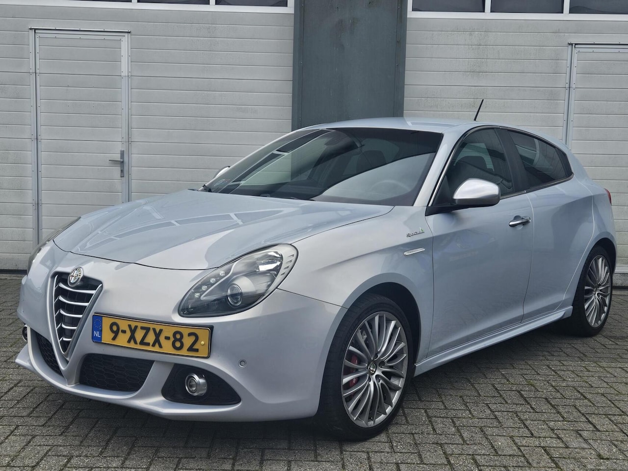 Alfa Romeo Giulietta - 1.6 JTDm Exclusive Sportiva|DAB+|Navi|18 Inch - AutoWereld.nl