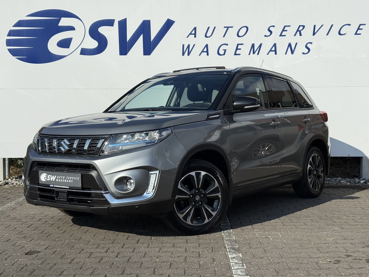 Suzuki Vitara - 1.5 Hybrid Style AllGrip | Pano | Navi | Camera | ACC | LED | Trekhaak - AutoWereld.nl