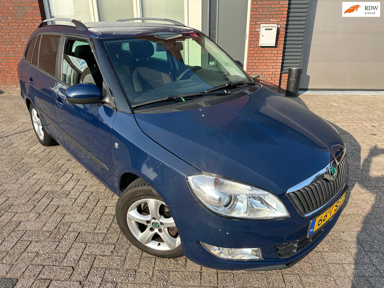 Skoda Fabia Combi - 1.2 TDI Greenline / Navi / Cruise / Airco / NAP - AutoWereld.nl