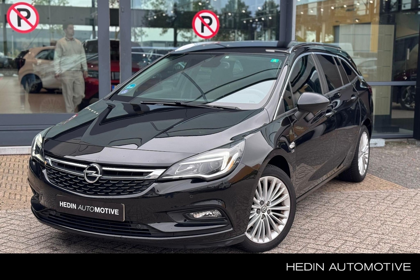 Opel Astra Sports Tourer - 1.4T 120 Jaar Edition | 150pk | Navigatie | Cruise control | Allseason banden | AGR-comfor - AutoWereld.nl