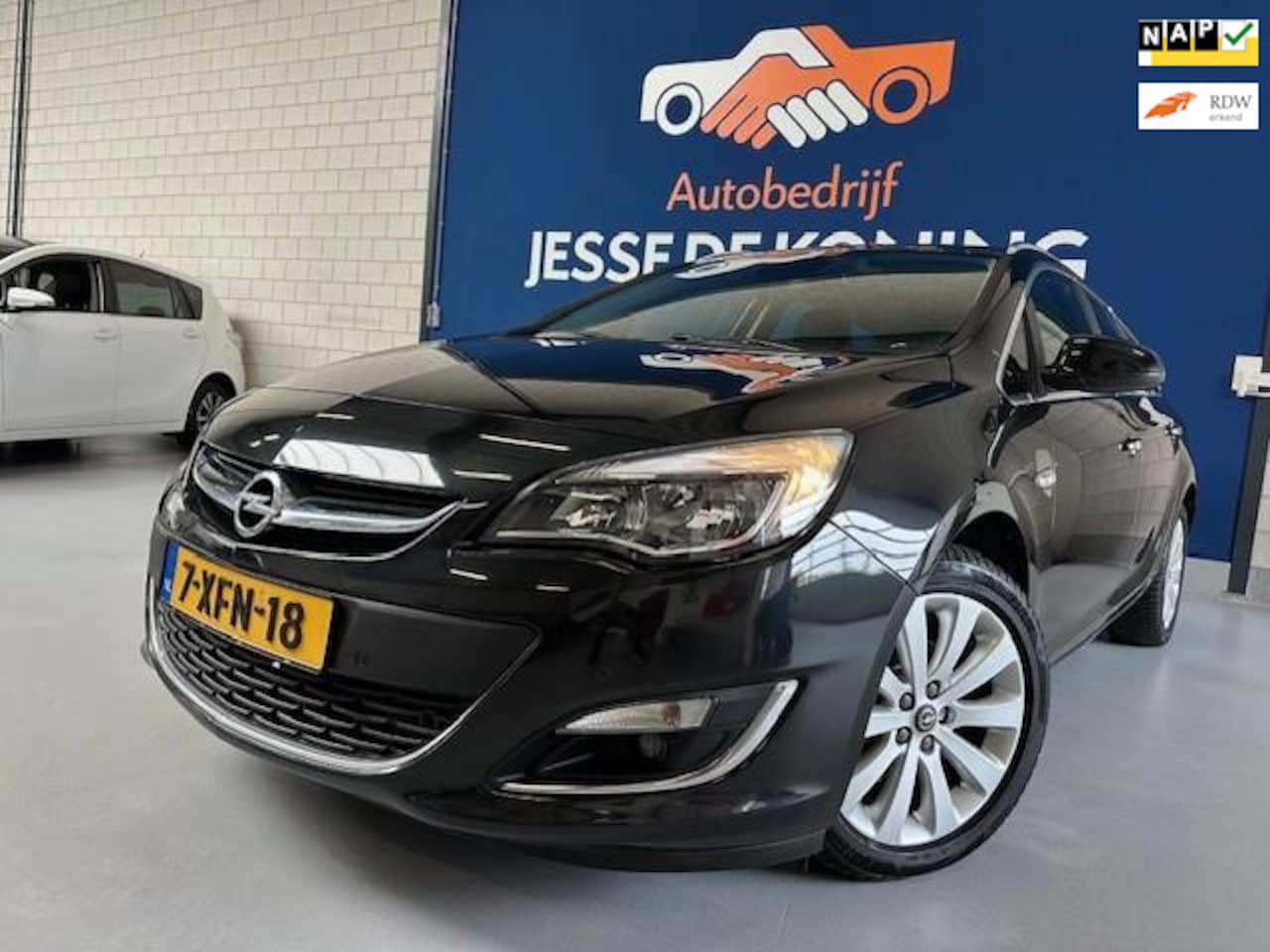 Opel Astra Sports Tourer - 1.4 Turbo Benzine Station/bj.2012/zwart/half leder/climate/trekhaak/sportvelgen/NAP 278286 - AutoWereld.nl