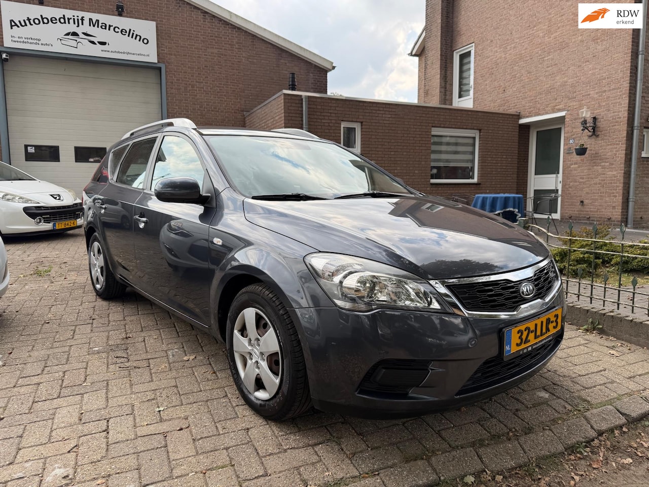Kia Cee'd Sporty Wagon - 1.4 CVVT X-tra 1.4 CVVT X-tra - AutoWereld.nl