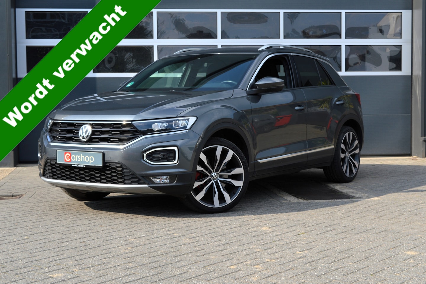 Volkswagen T-Roc - 2.0 TSI 4Motion Sport Business Automaat | Virt.Cockpit/Keyless/Clima/Carplay | Met 12 maan - AutoWereld.nl