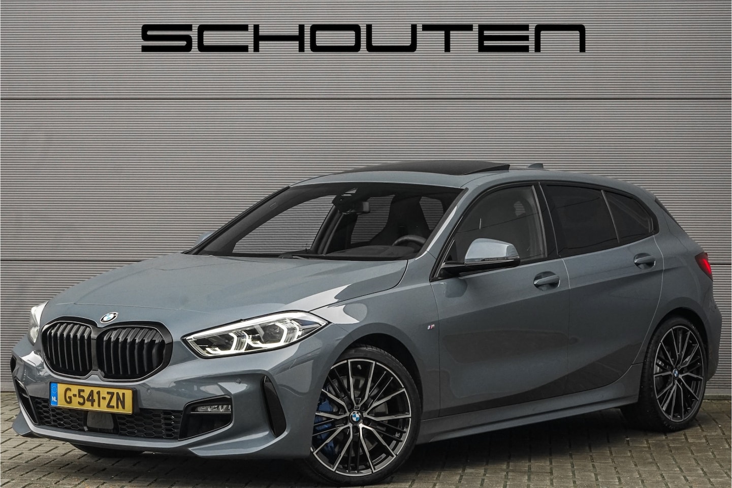 BMW 1-serie - 118i High Ex M-Sport Shadow Pano Leder 18" - AutoWereld.nl