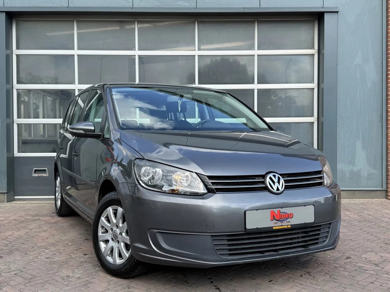 Volkswagen Touran - 1.2 TSI 105pk 7 Pers LMV export - AutoWereld.nl
