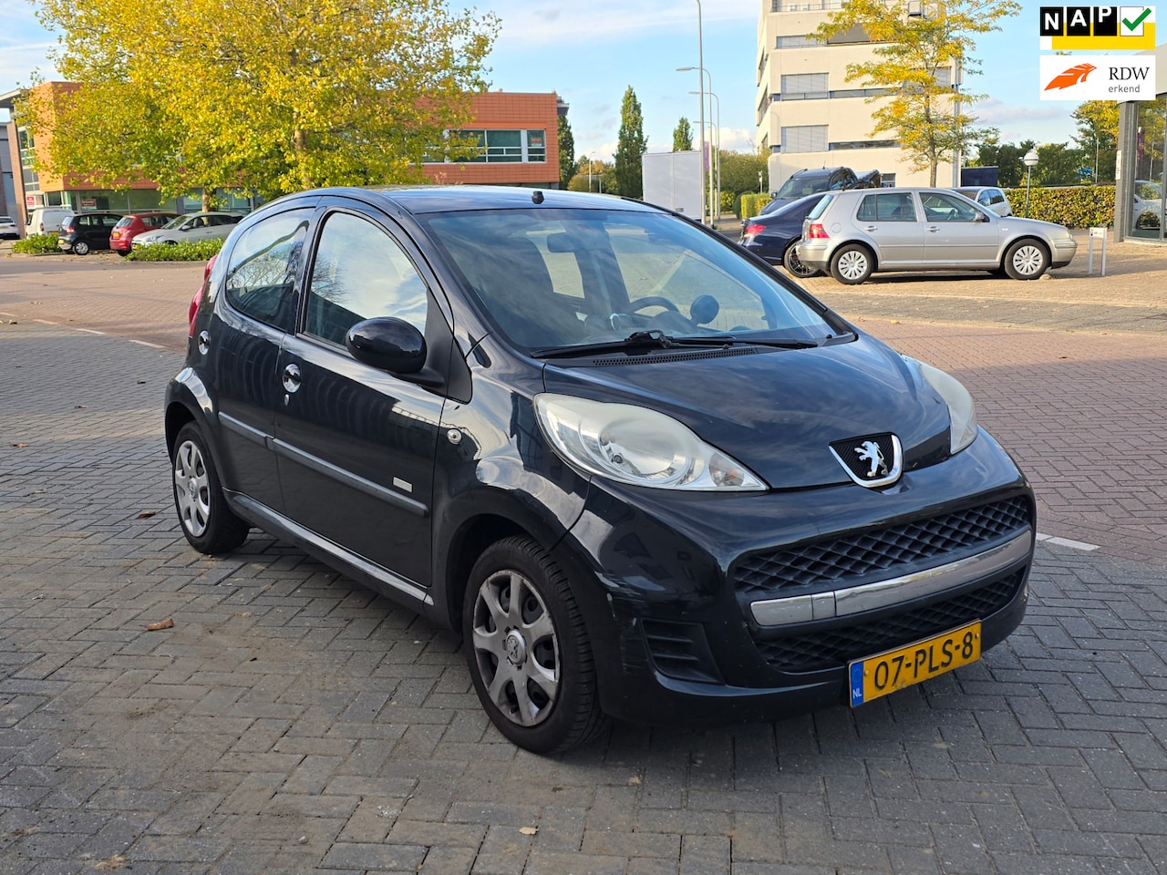 Peugeot 107 - 1.0-12V Millesim 200 Advertentie Lezen |Rijdt Goed - AutoWereld.nl
