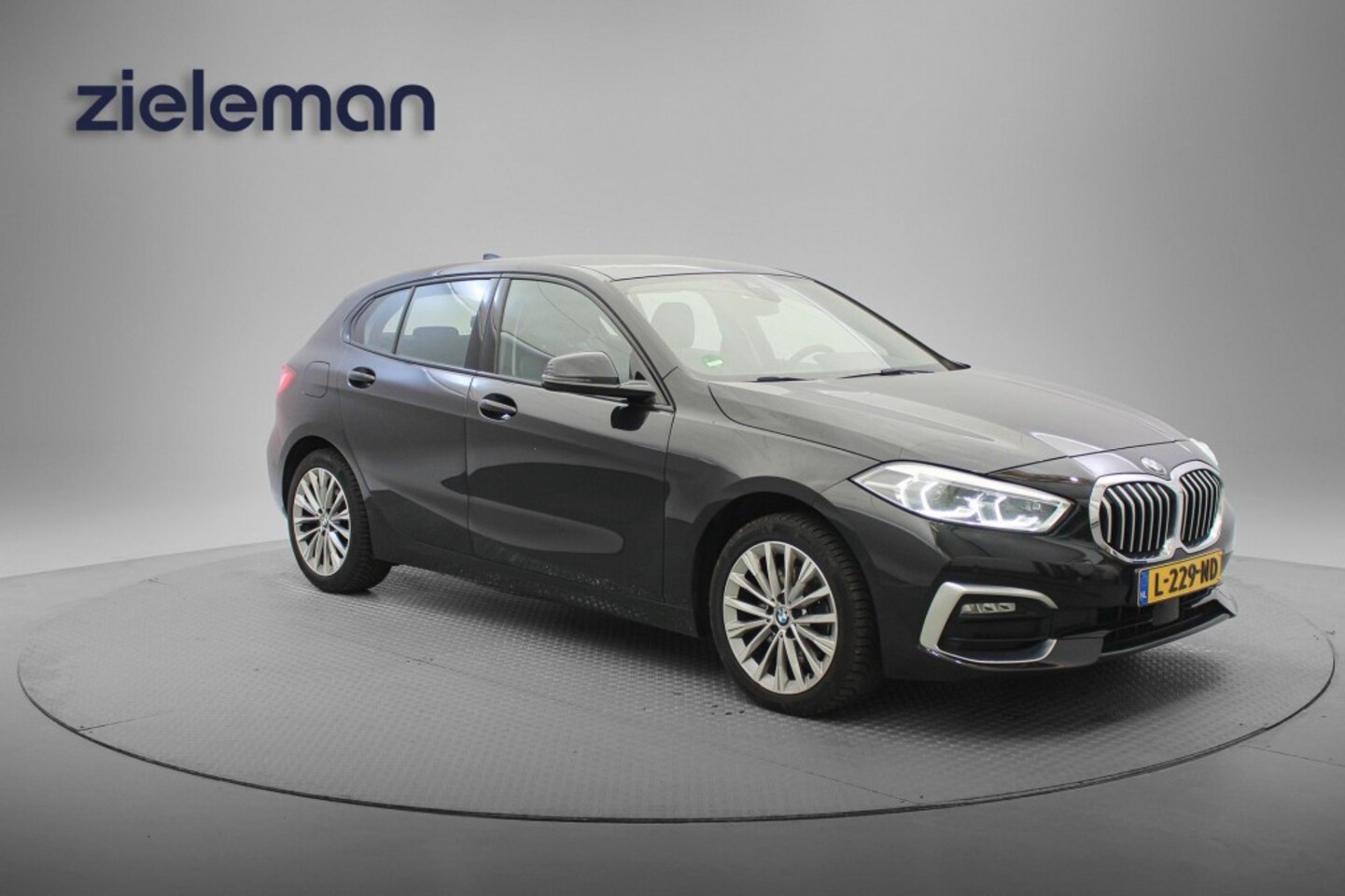 BMW 1-serie - 118i Business Edition - Carplay, Camera, Leer, Cruise - AutoWereld.nl
