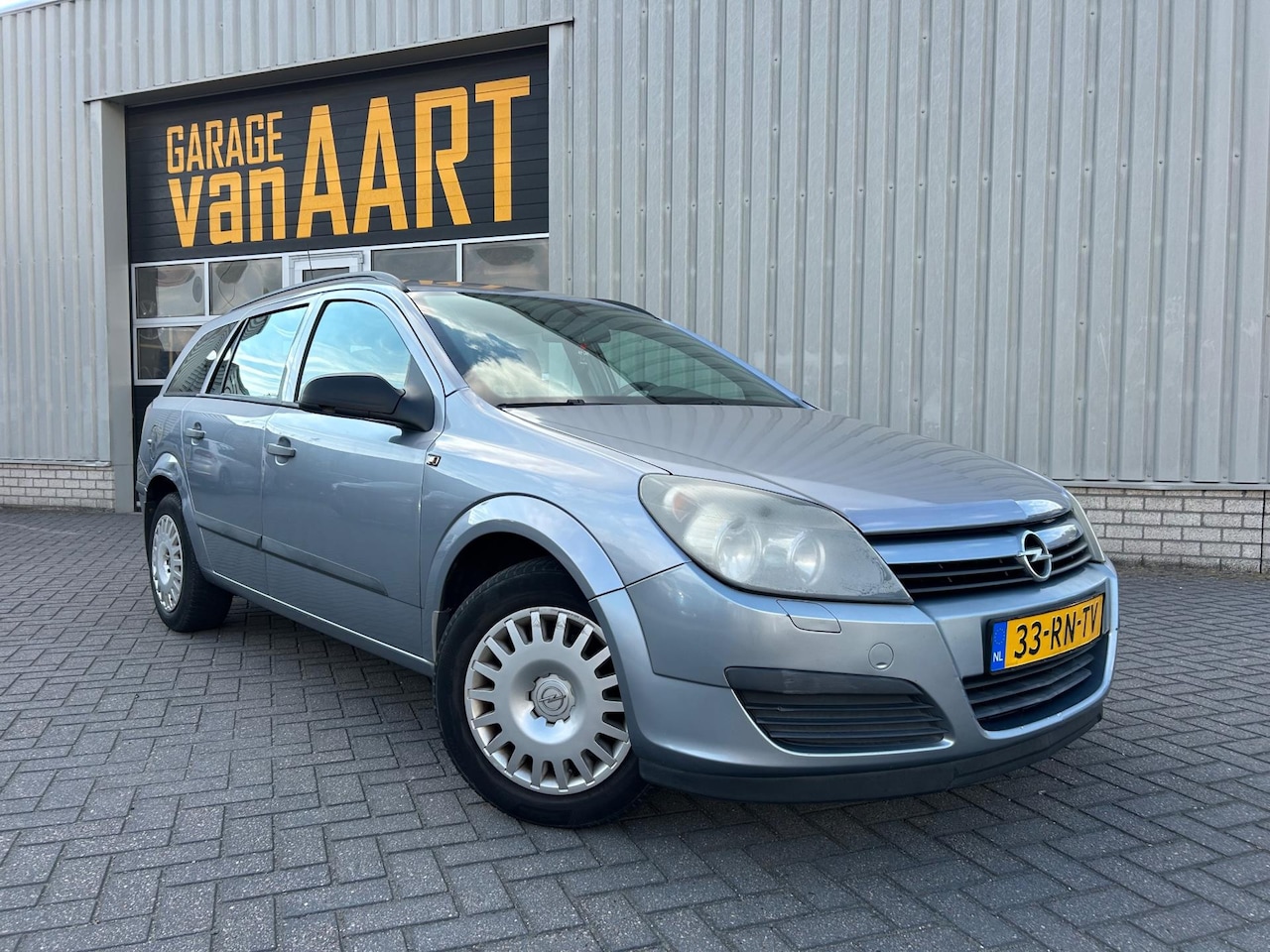 Opel Astra Wagon - 1.4 Essentia | CRUISE | AIRCO | - AutoWereld.nl