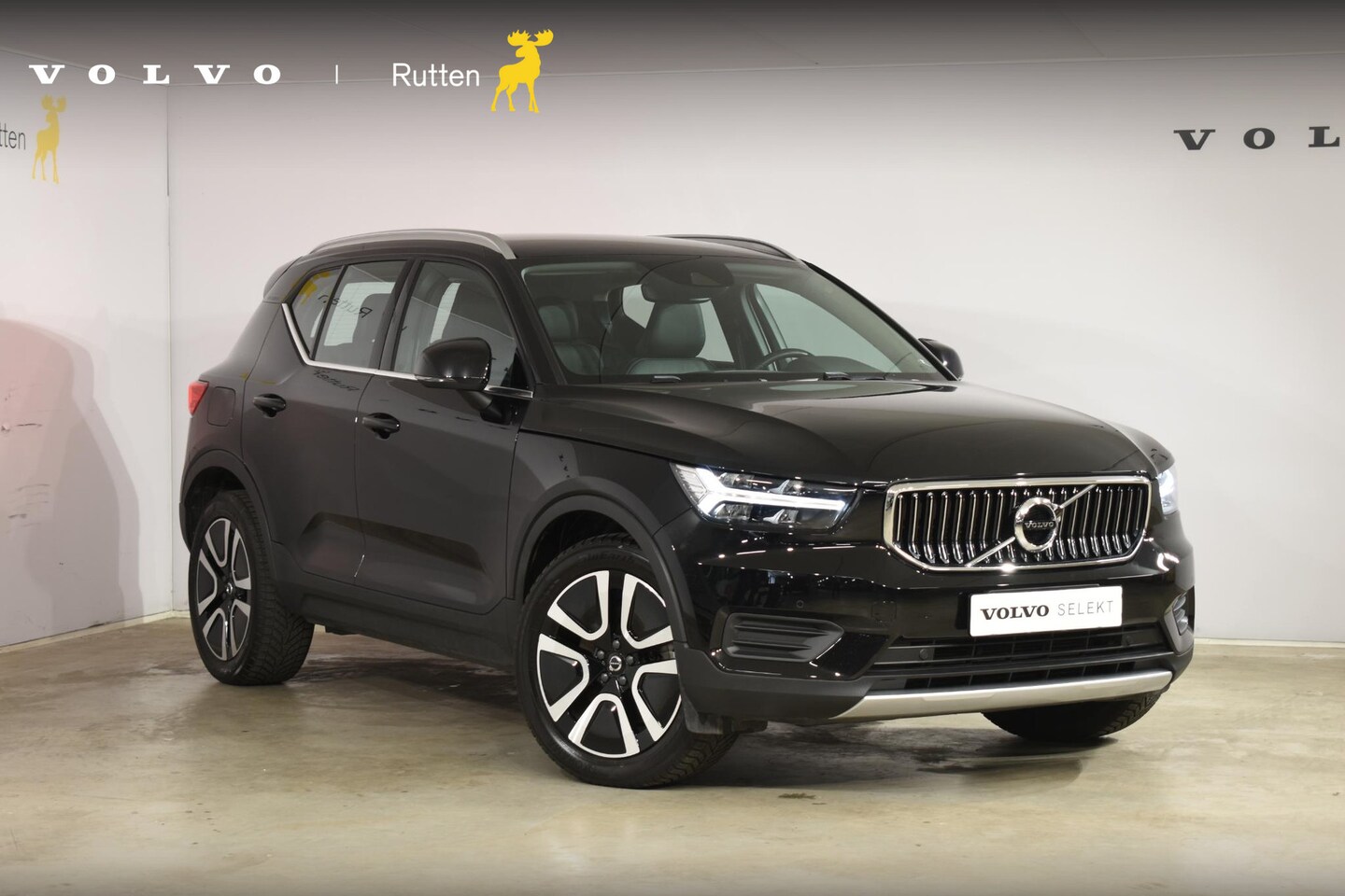 Volvo XC40 - T5 262PK Automaat Plug-in Hybrid Inscription / Navigatie / Leren bekleding / Parkeersensor - AutoWereld.nl