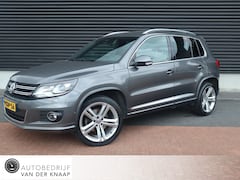Volkswagen Tiguan - 2.0 TSI Sport&Style 4Motion R-line | Airco | Cruise | Multimedia/Navi | PDC + Camera | Sto