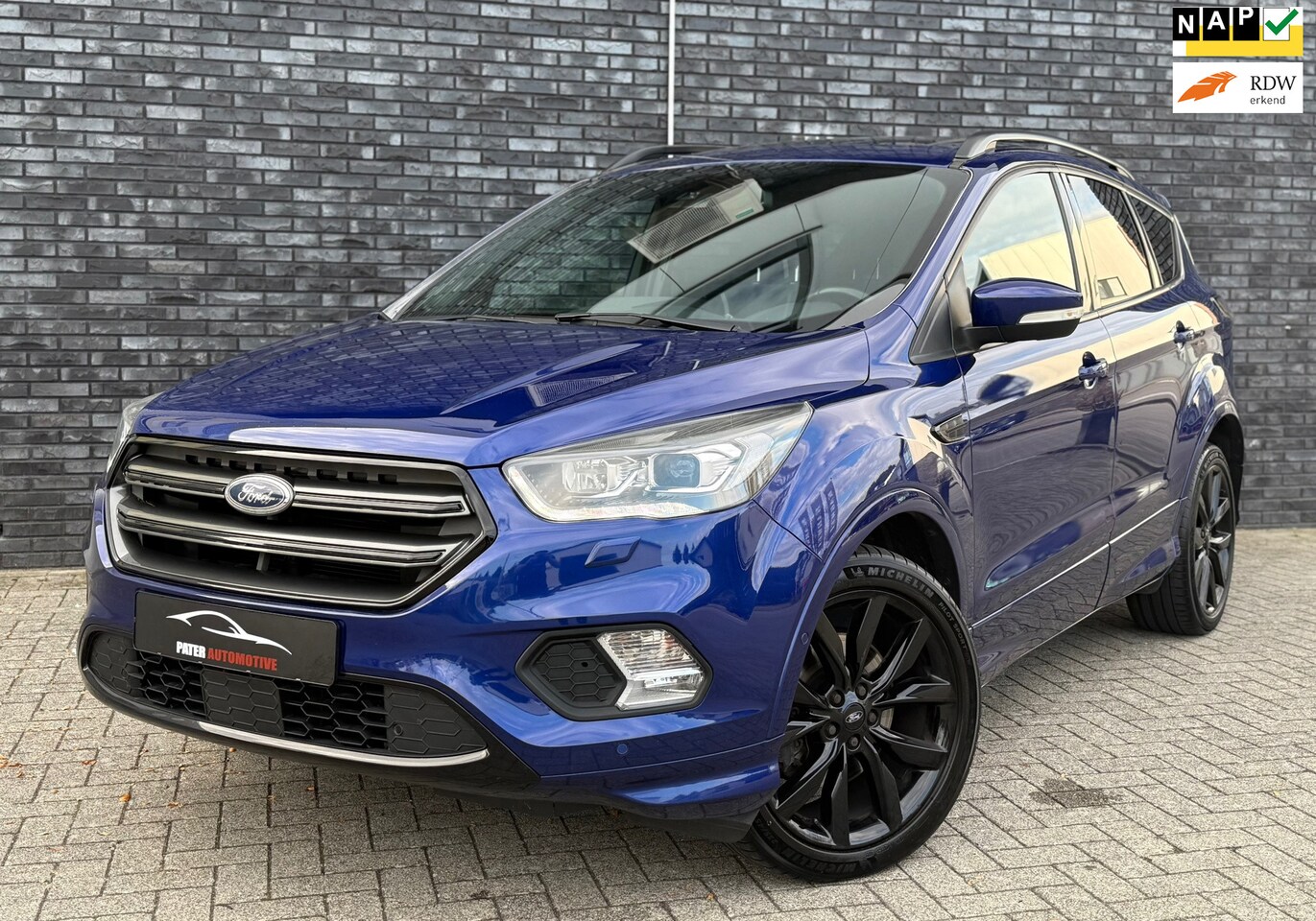 Ford Kuga - 1.5 EcoBoost ST Line Aut|Panorama|Adap Cruise|1800kg Trekgewicht|BLIS|VOL OPTIE!! - AutoWereld.nl