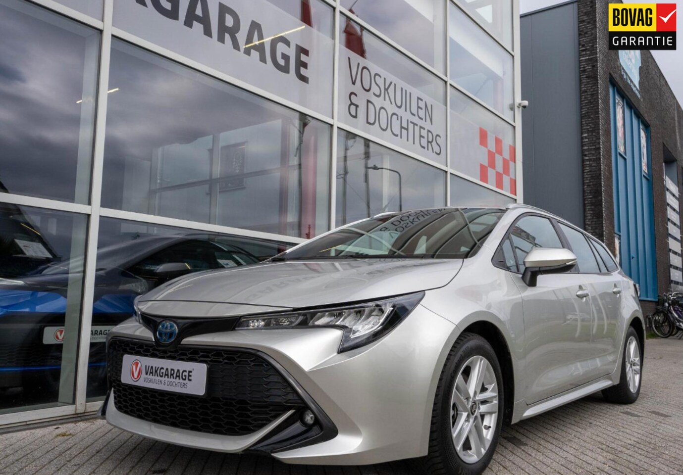 Toyota Corolla Touring Sports - 1.8 Hybrid Business | Stoelverwarming | Navigatie | Camera - AutoWereld.nl