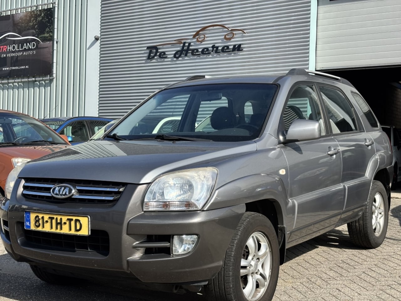 Kia Sportage - 2.0 CVVT Executive 2.0 CVVT Executive - AutoWereld.nl