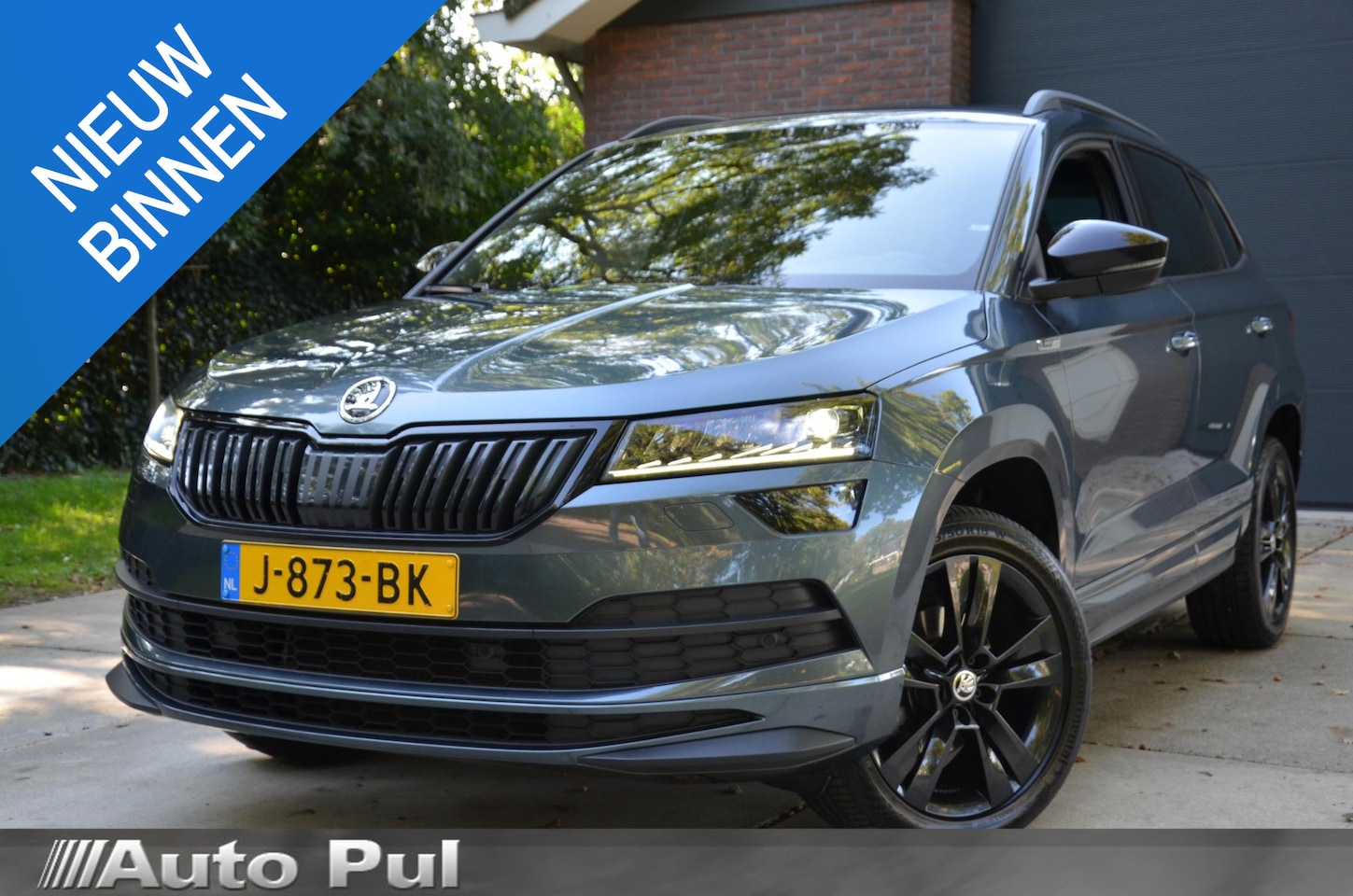 Skoda Karoq - 1.5 TSI ACT Sportline Business Automaat/Navi/Audio installatie premium/Led/Pdc/Ecc/Stoelve - AutoWereld.nl
