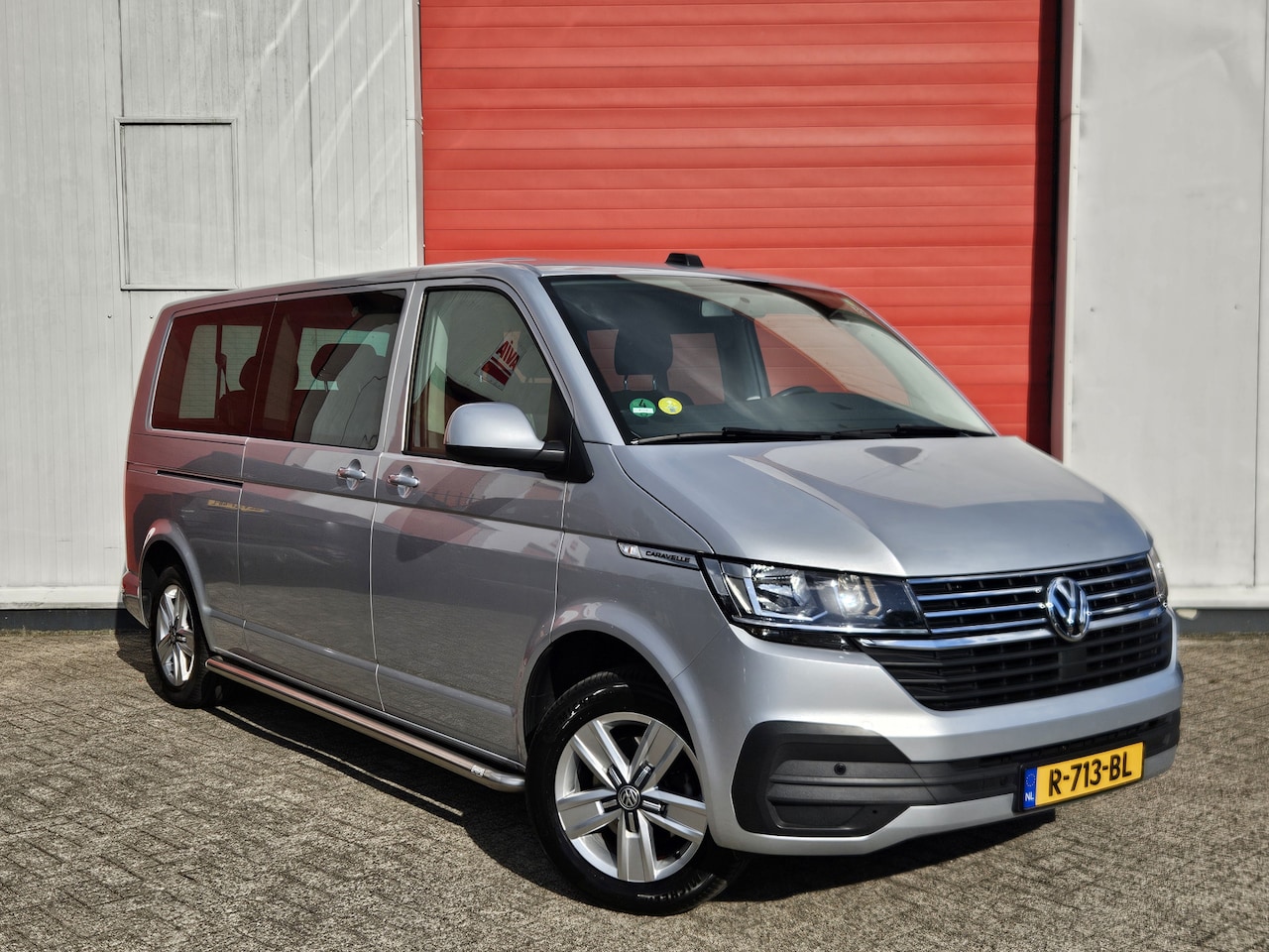 Volkswagen Transporter Caravelle - 2.0 TDI L2H1 | 9 Pers. | PDC | Cruisec. - AutoWereld.nl