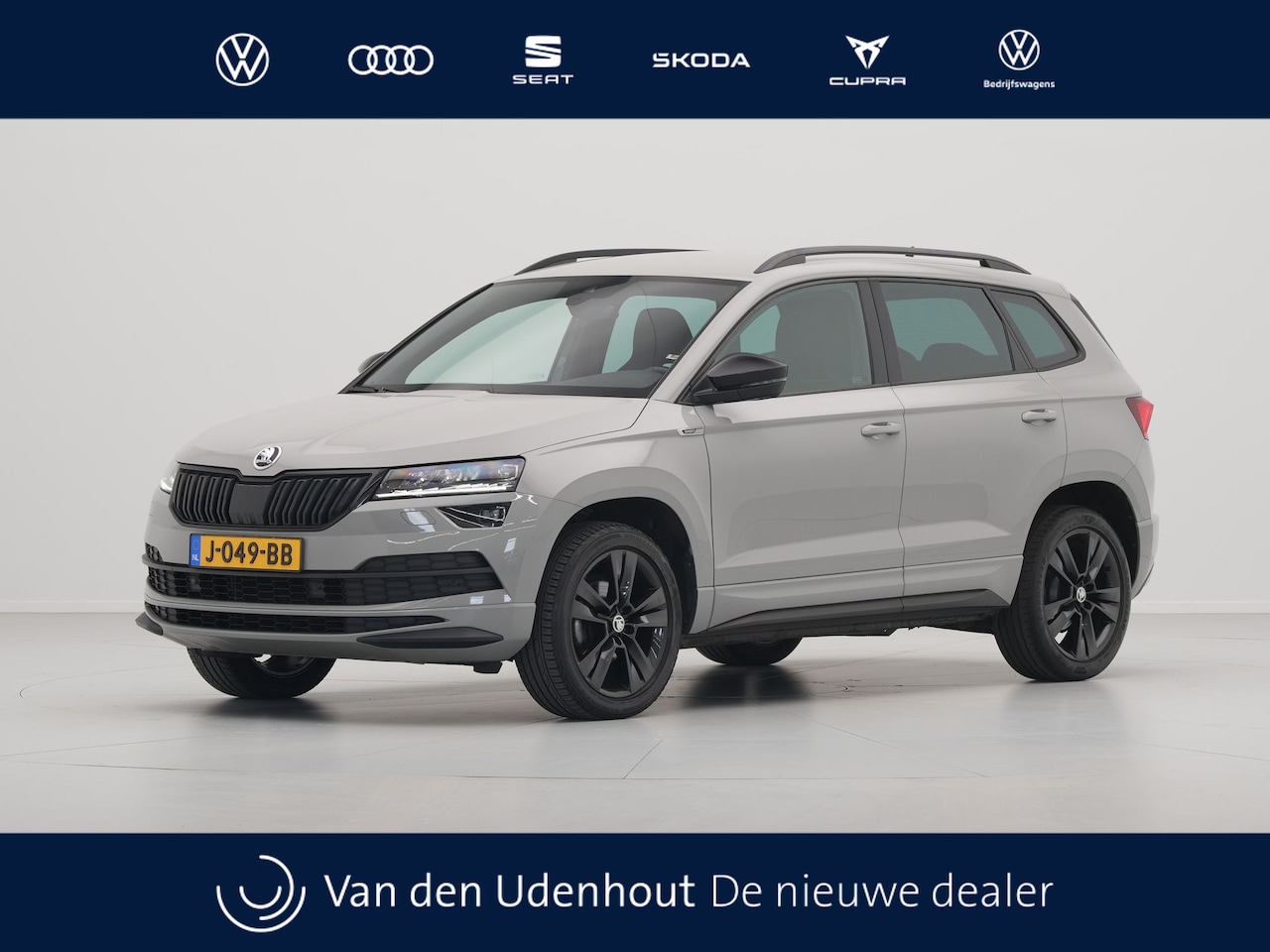 Skoda Karoq - 1.5 TSI ACT 150pk DSG Sportline Business Navigatie CantonSound Stoelverwarming Camera Carp - AutoWereld.nl