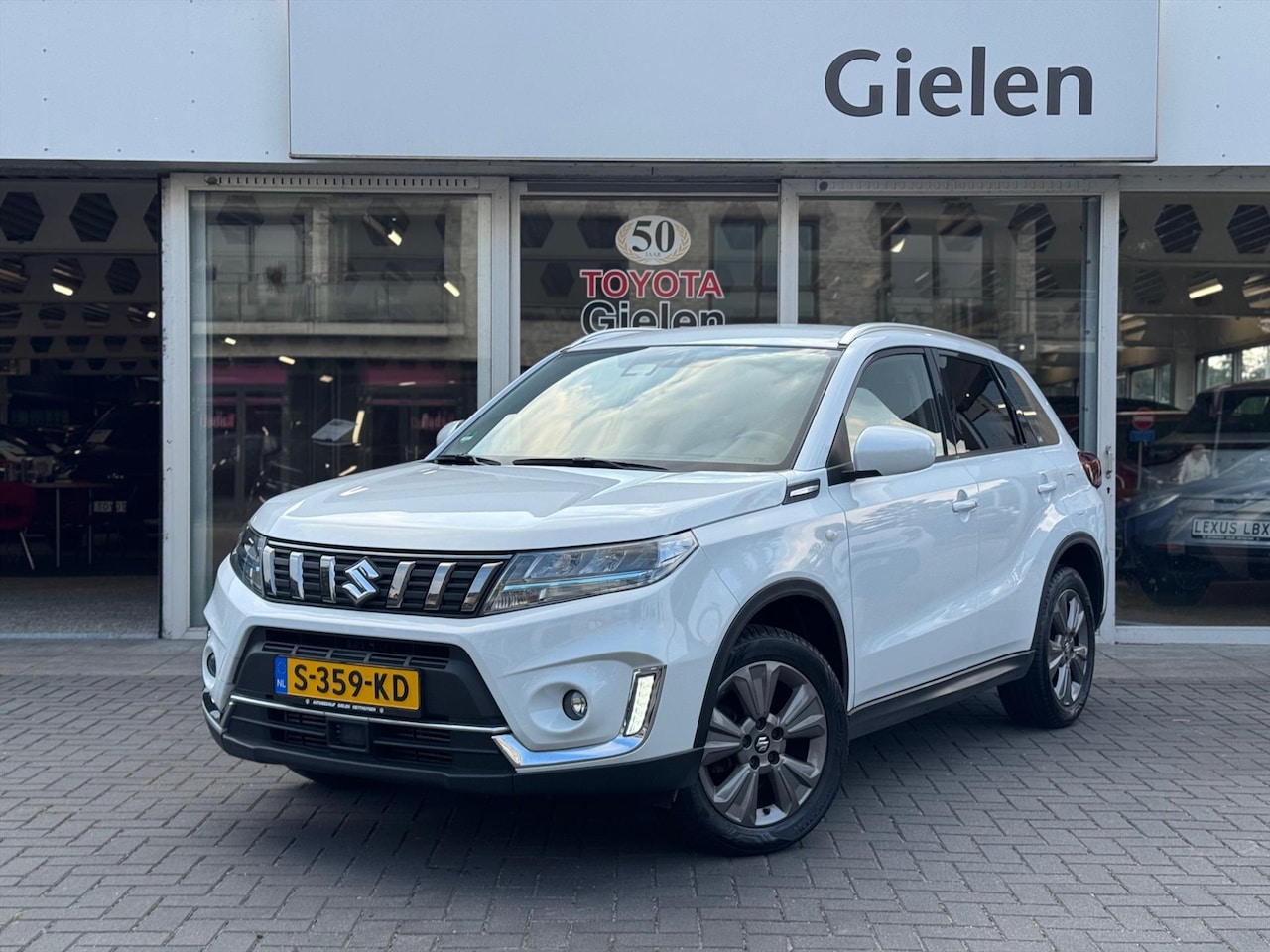 Suzuki Vitara - 1.4 Boosterjet Smart Hybrid Automaat Select | Trekhaak, Apple CarPlay/Android Auto, Stoelv - AutoWereld.nl