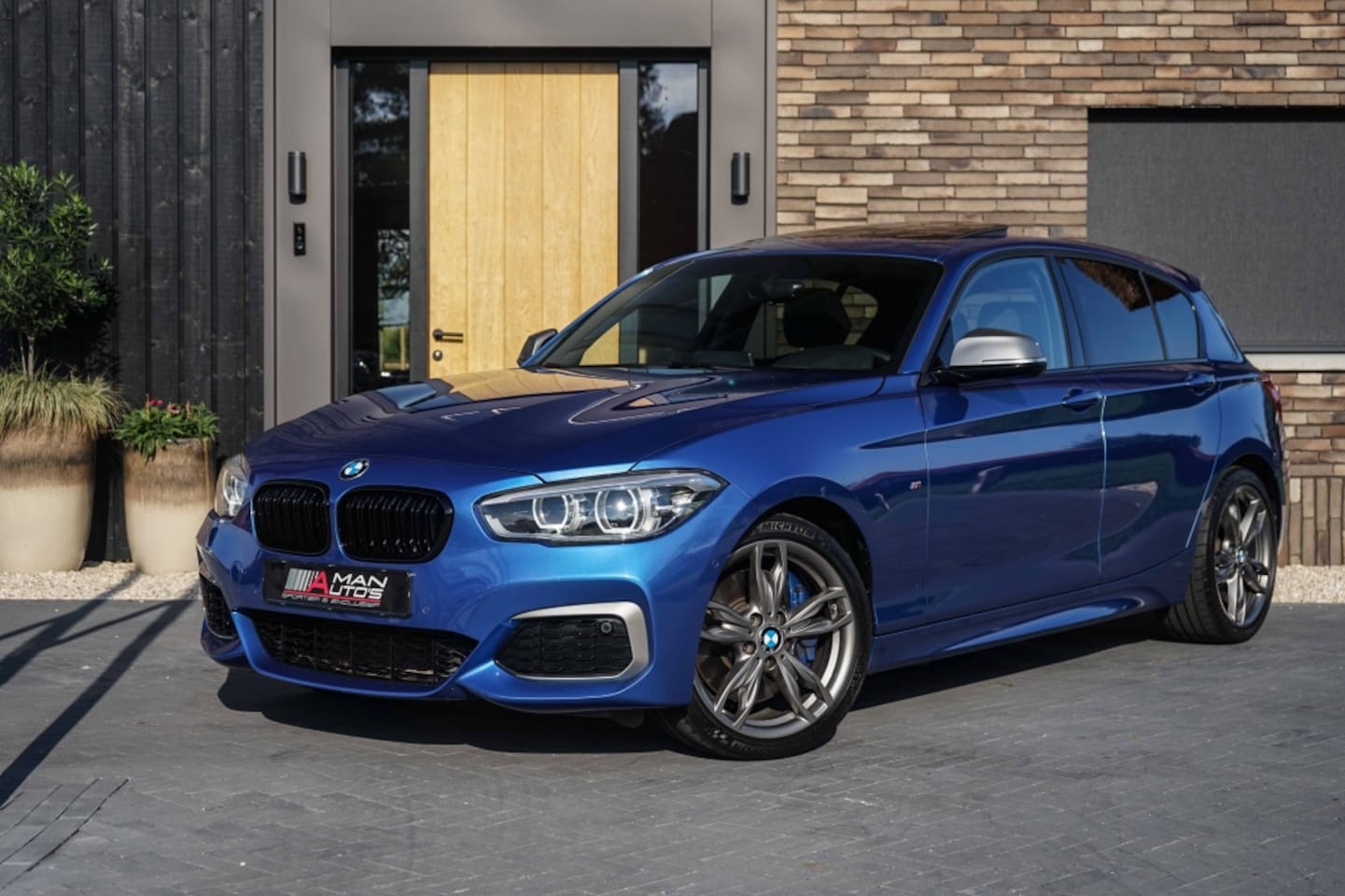 BMW 1-serie - M140i xDrive 340PK/Pano/HK/RCam/B58 - AutoWereld.nl