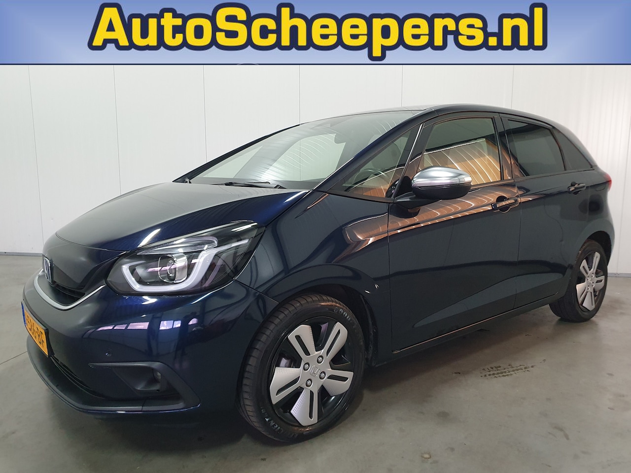 Honda Jazz - 1.5 e:HEV Executive NAVI/CRUISE/AIRCO/LMV - AutoWereld.nl