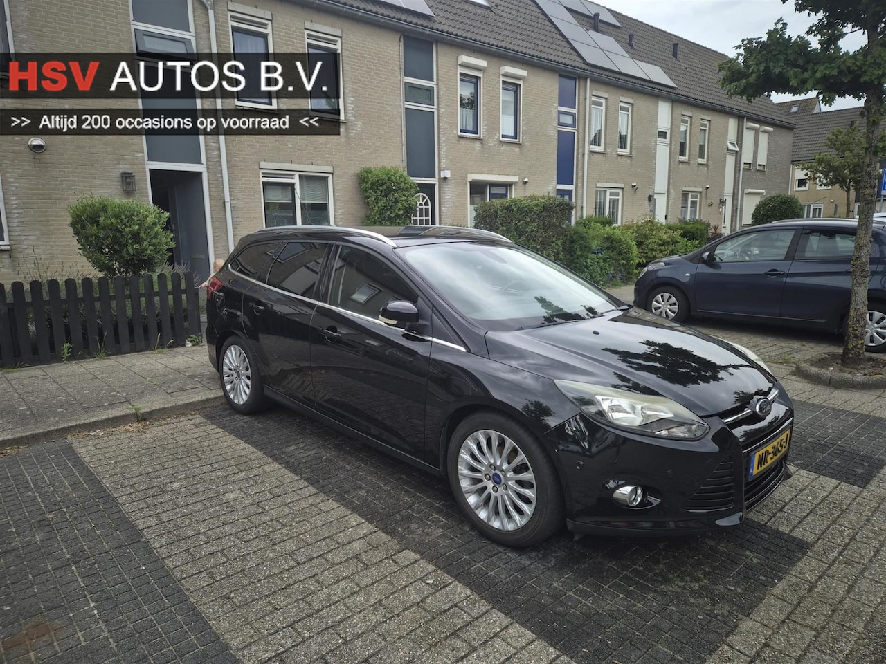 Ford Focus Wagon - 1.0 EcoBoost Titanium navi LM airco - AutoWereld.nl