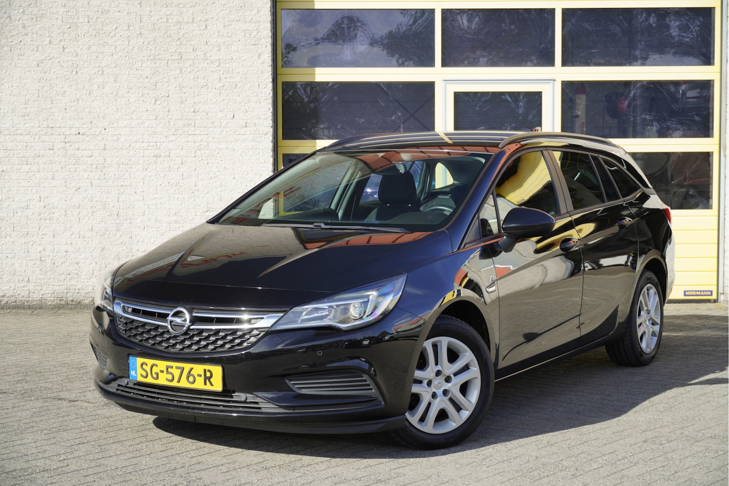 Opel Astra Sports Tourer - 1.0 Online Edition BJ2018 Led | Pdc | Navi | Airco | Cruise control | Getint glas - AutoWereld.nl