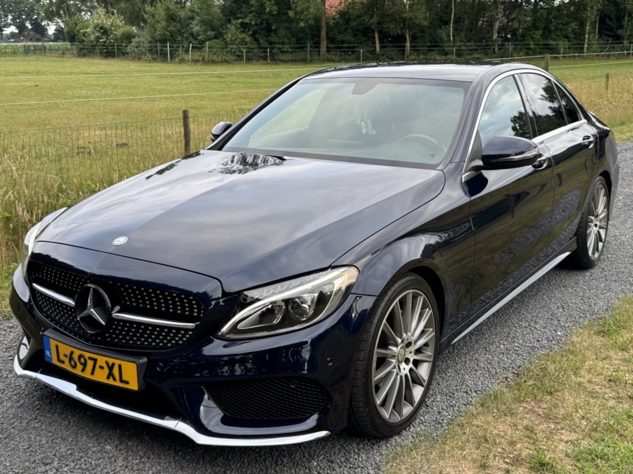 Mercedes-Benz C-klasse - 180 Prestige AMG| AUTOMAAT| LEER| CLIMA| NAVI| 19” - AutoWereld.nl