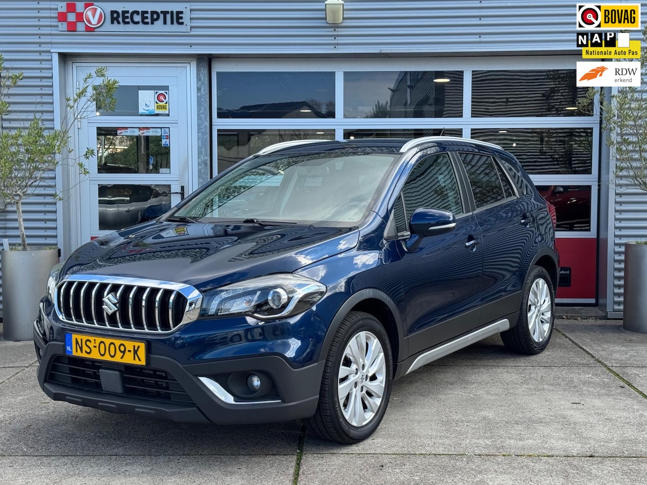 Suzuki S-Cross - 1.0 Boosterjet Exclusive / Navi / Camera / Carplay / Trekhaak - AutoWereld.nl