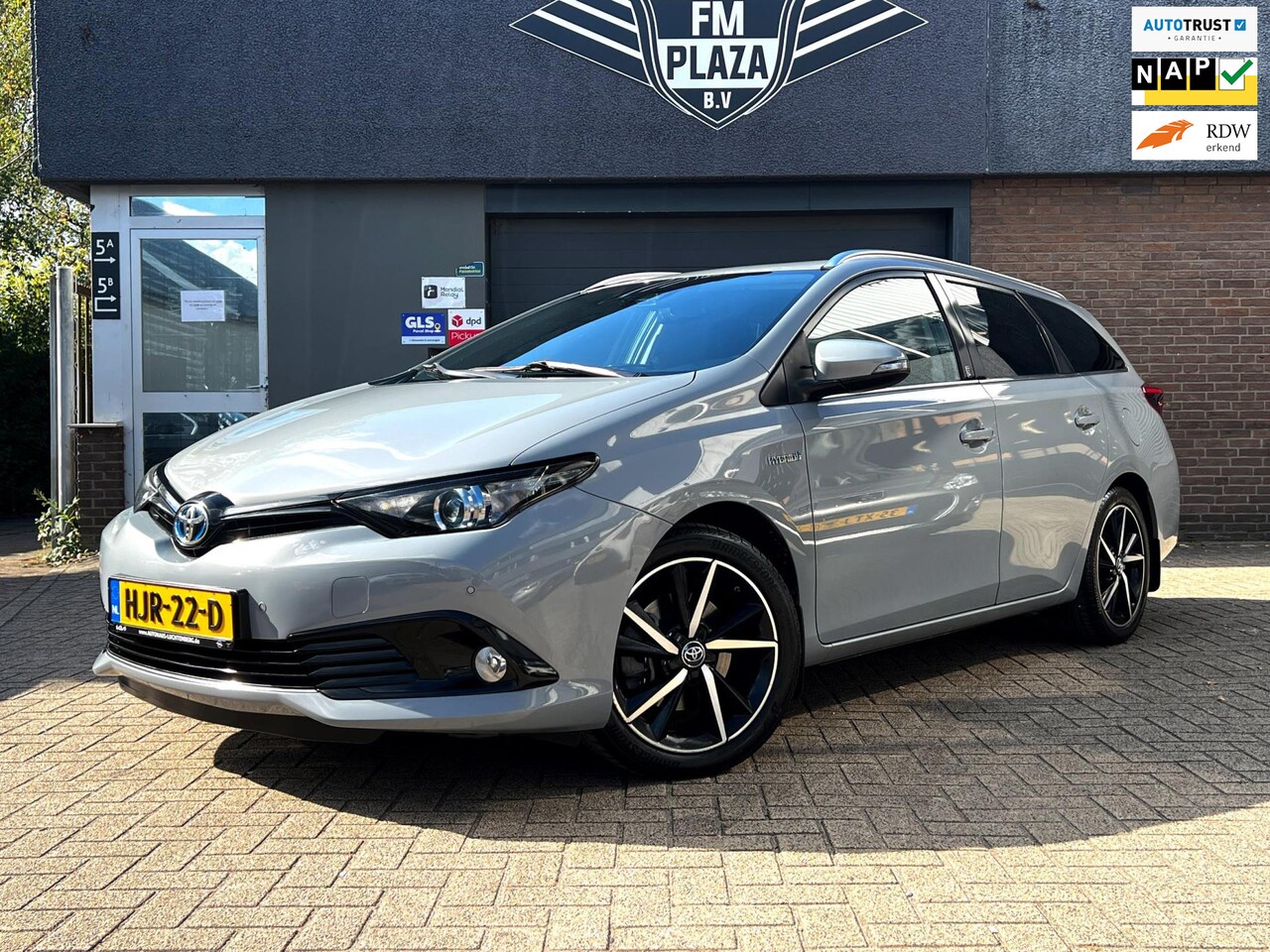 Toyota Auris Touring Sports - 1.8 Hybrid Freestylecarplay_Camera_Terkhaak - AutoWereld.nl