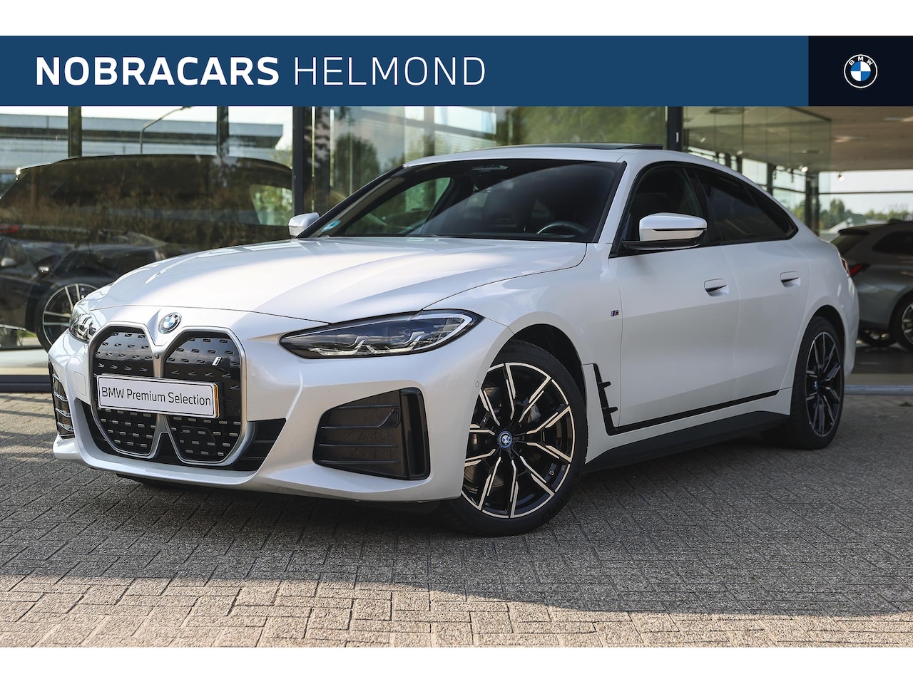BMW i4 - eDrive40 High Executive M Sport / Schuif-kanteldak / Trekhaak / M Sportstoelen / M Adaptie - AutoWereld.nl
