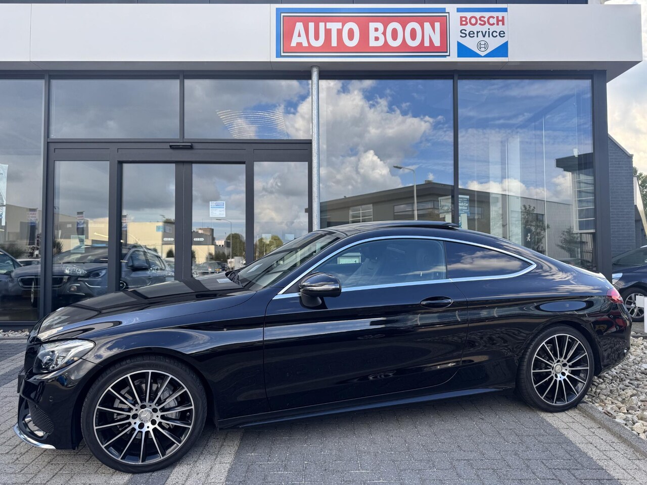 Mercedes-Benz C-klasse Coupé - 180 AMG AUTOMAAT PANO/NAVI/P-CAM/19INCH.AMG/ LED/S&S- 2e EIG. - KM=NAP - - AutoWereld.nl